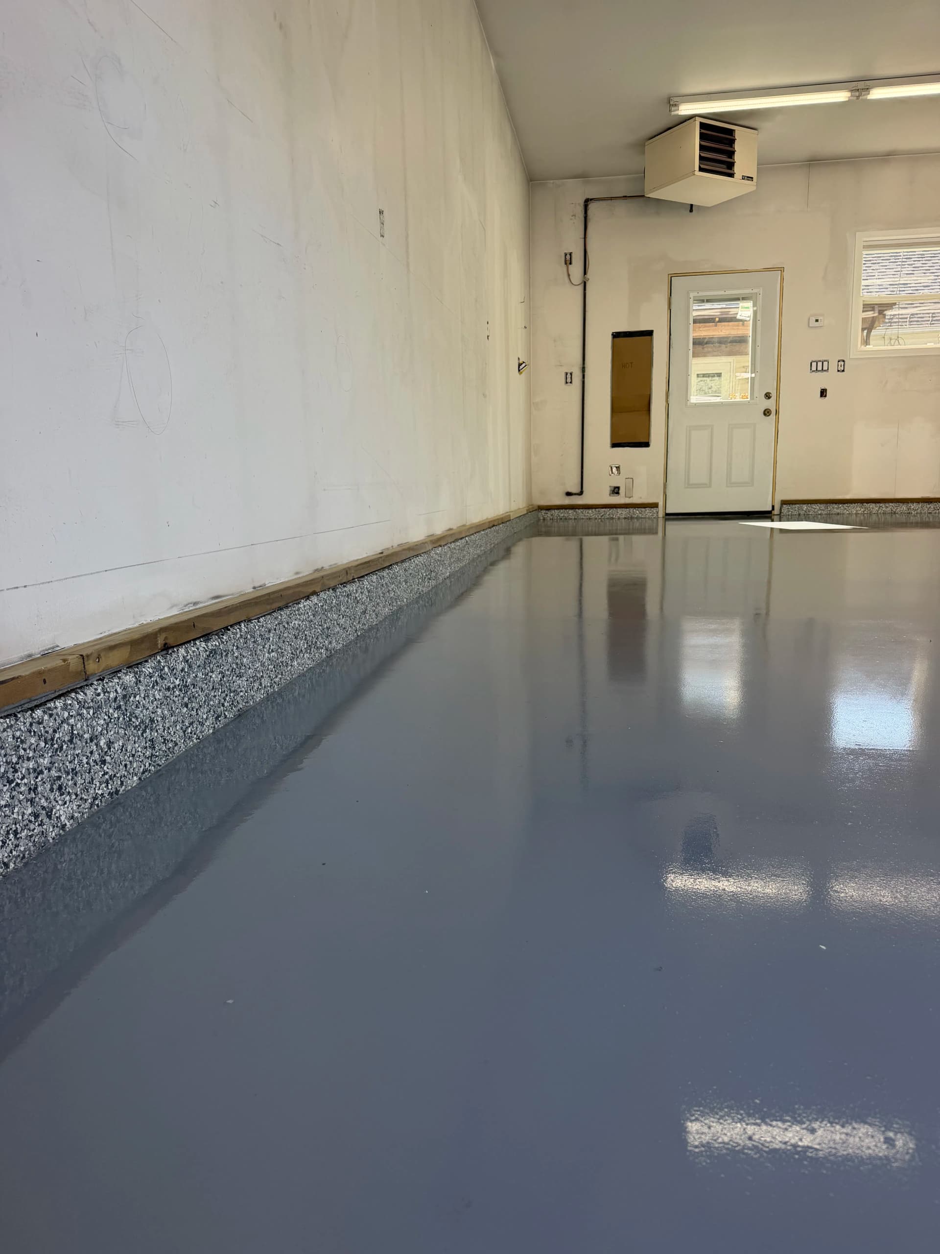 Gray Epoxy Garage Floor with Flaked Stem Walls Done Right