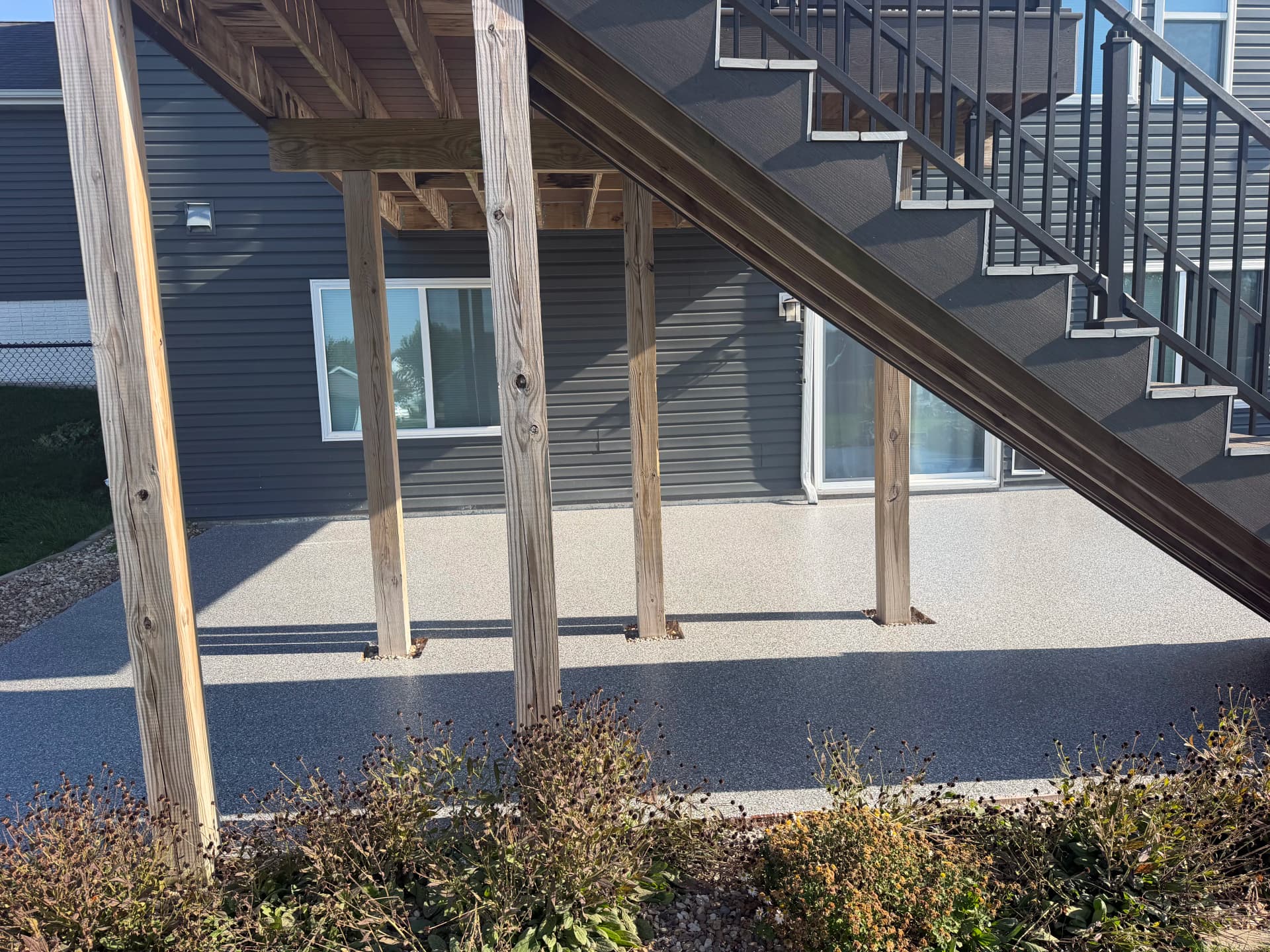 Gallery photos for Outdoor Flake Floor System in Weathered Grey Upgrades Backyard Patio: Image #1