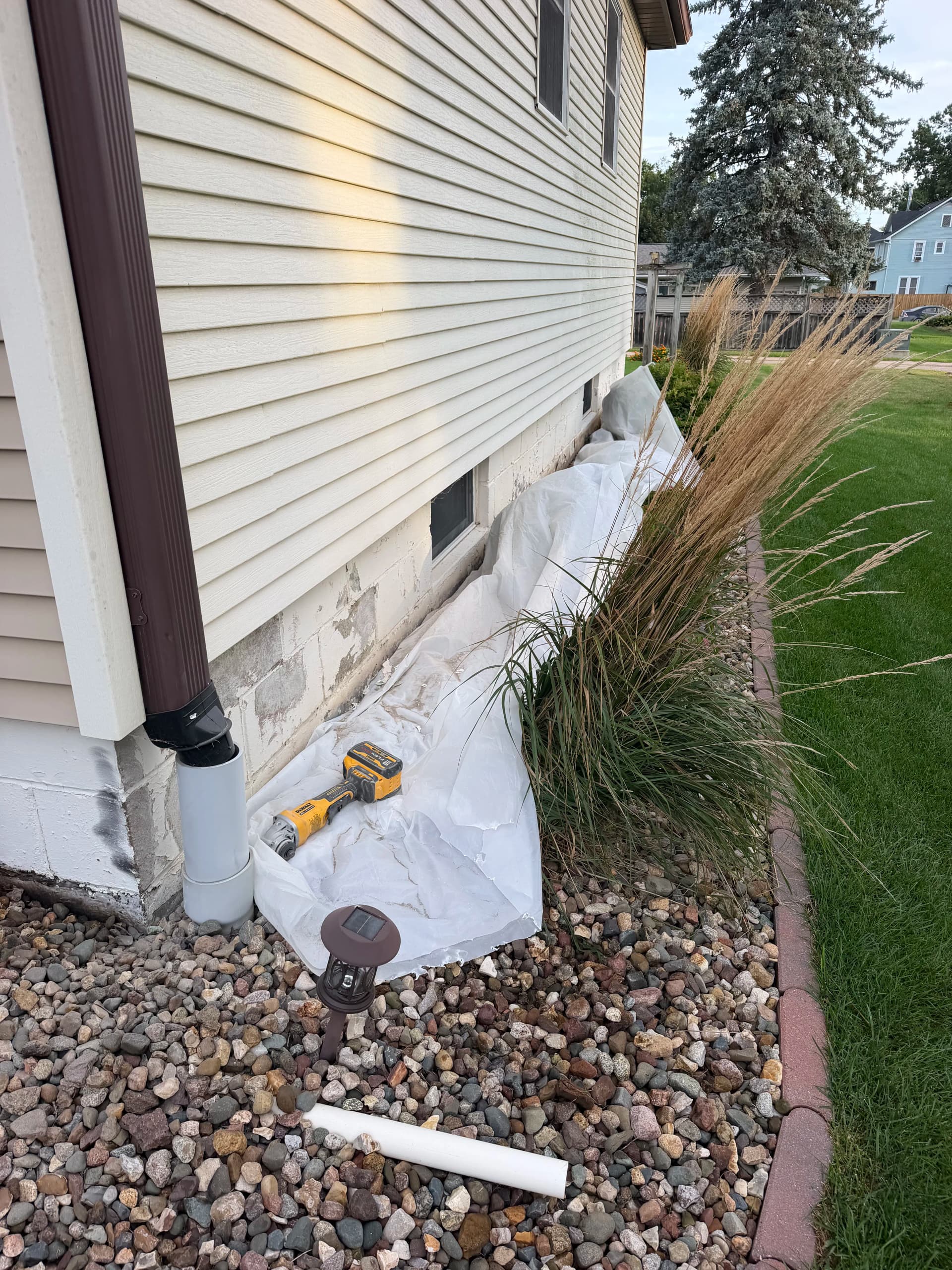 Gallery photos for Garnet Flake Polyaspartic Coating on a Home Foundation Wall: Image #3