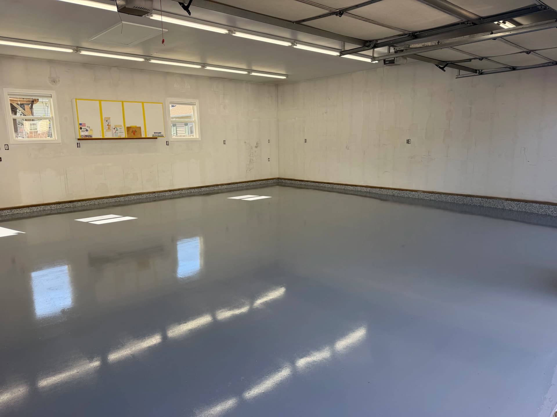 Gray Epoxy Garage Floor with Flaked Stem Walls Done Right