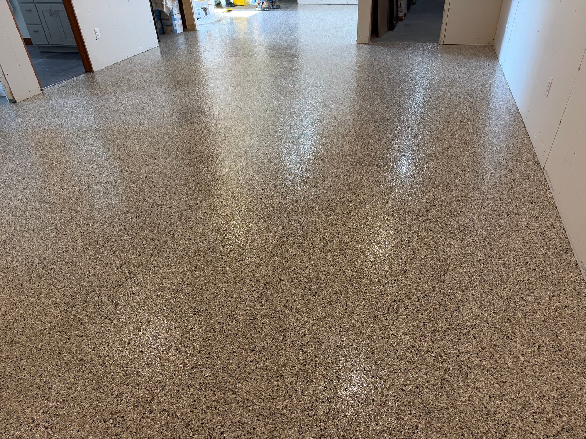 Basement Floor Gets a 1/4 Inch Coyote Flake Epoxy System image