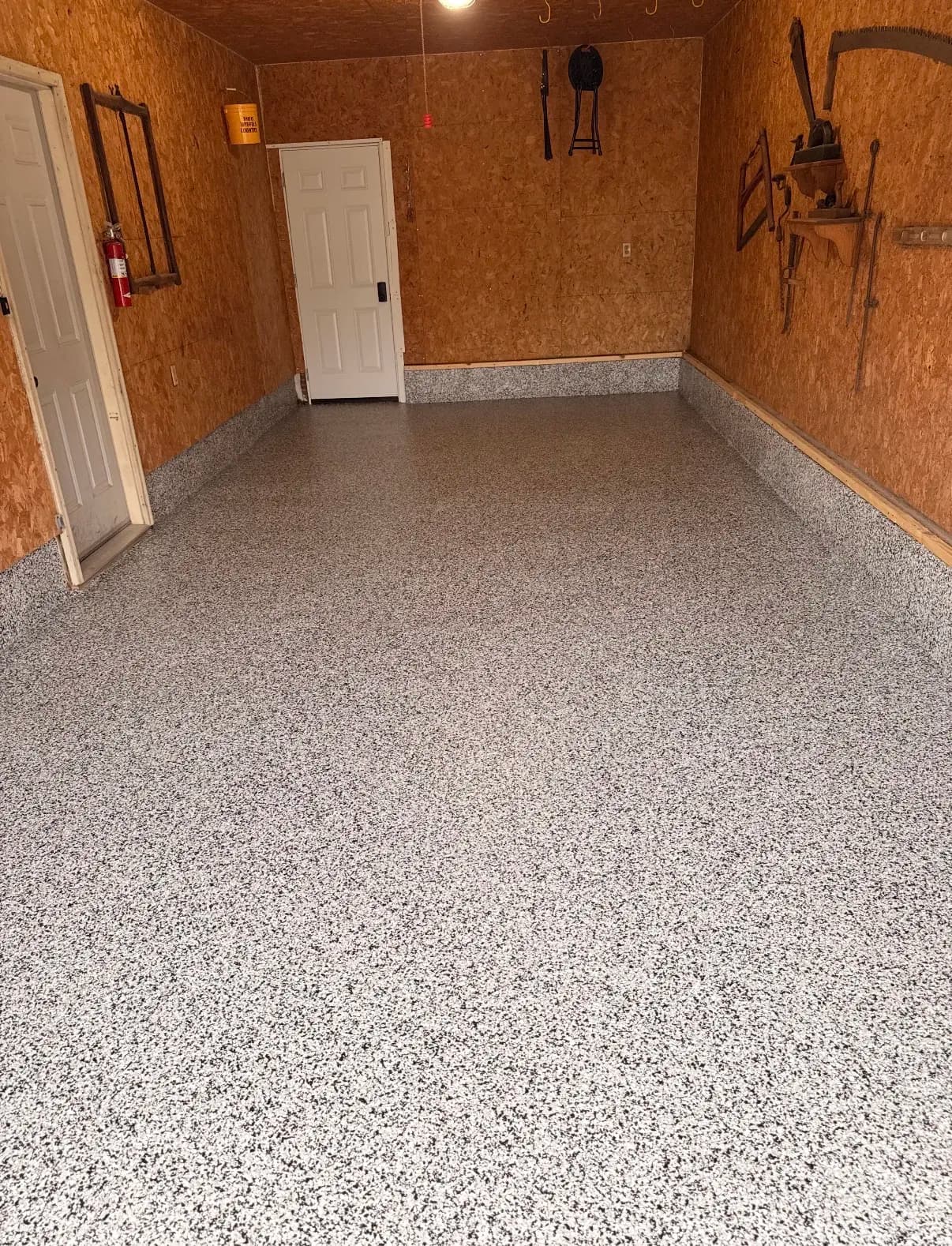 Project Single-Stall Garage Floor Coated in Domino Flake image