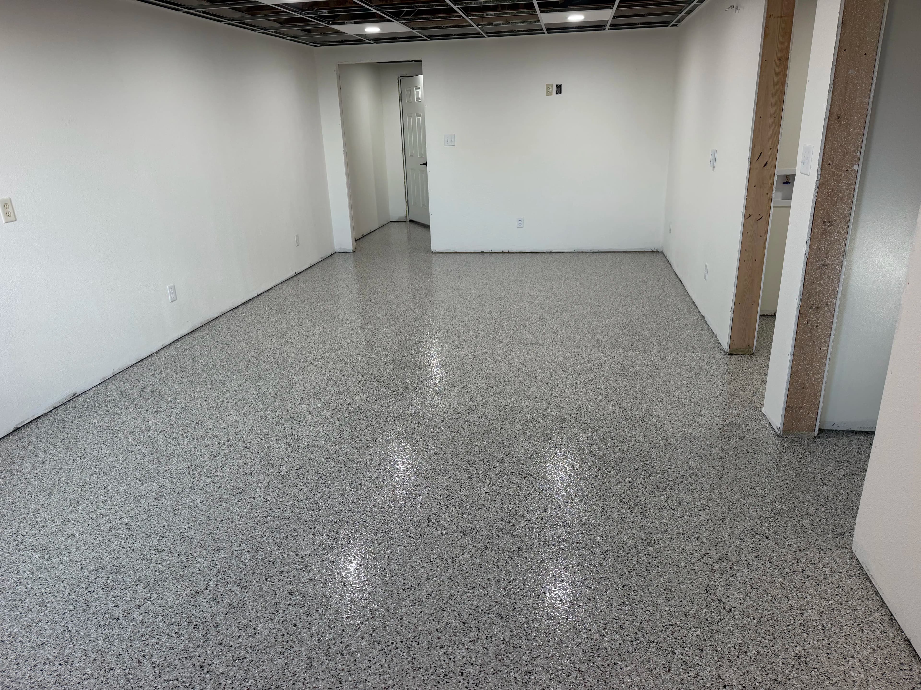 Project Coyote Flake Epoxy Floors Laid Across an Entire Basement image