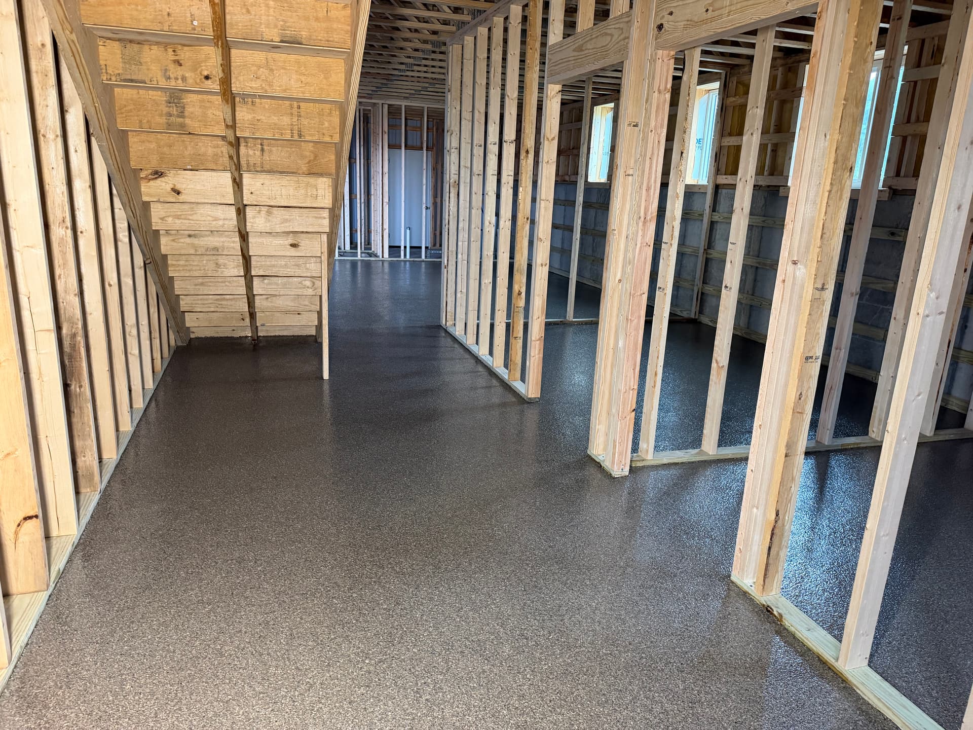 Obsidian Flake Epoxy Floor System for a Shop Office and Kitchen image