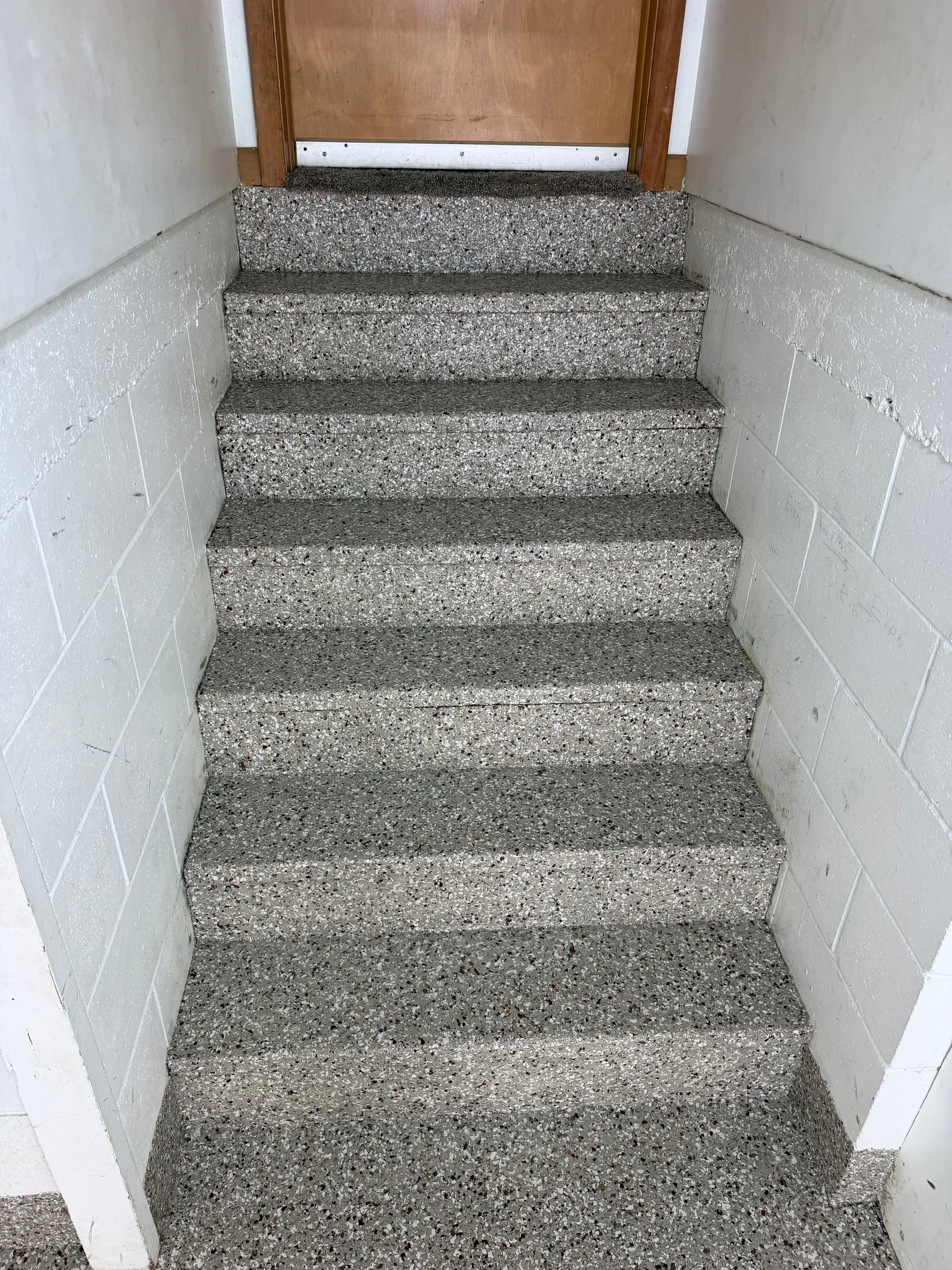 Gallery photos for Creekbed Flake Floor System Covers a 2-Stall Garage and Sunroom: Image #1