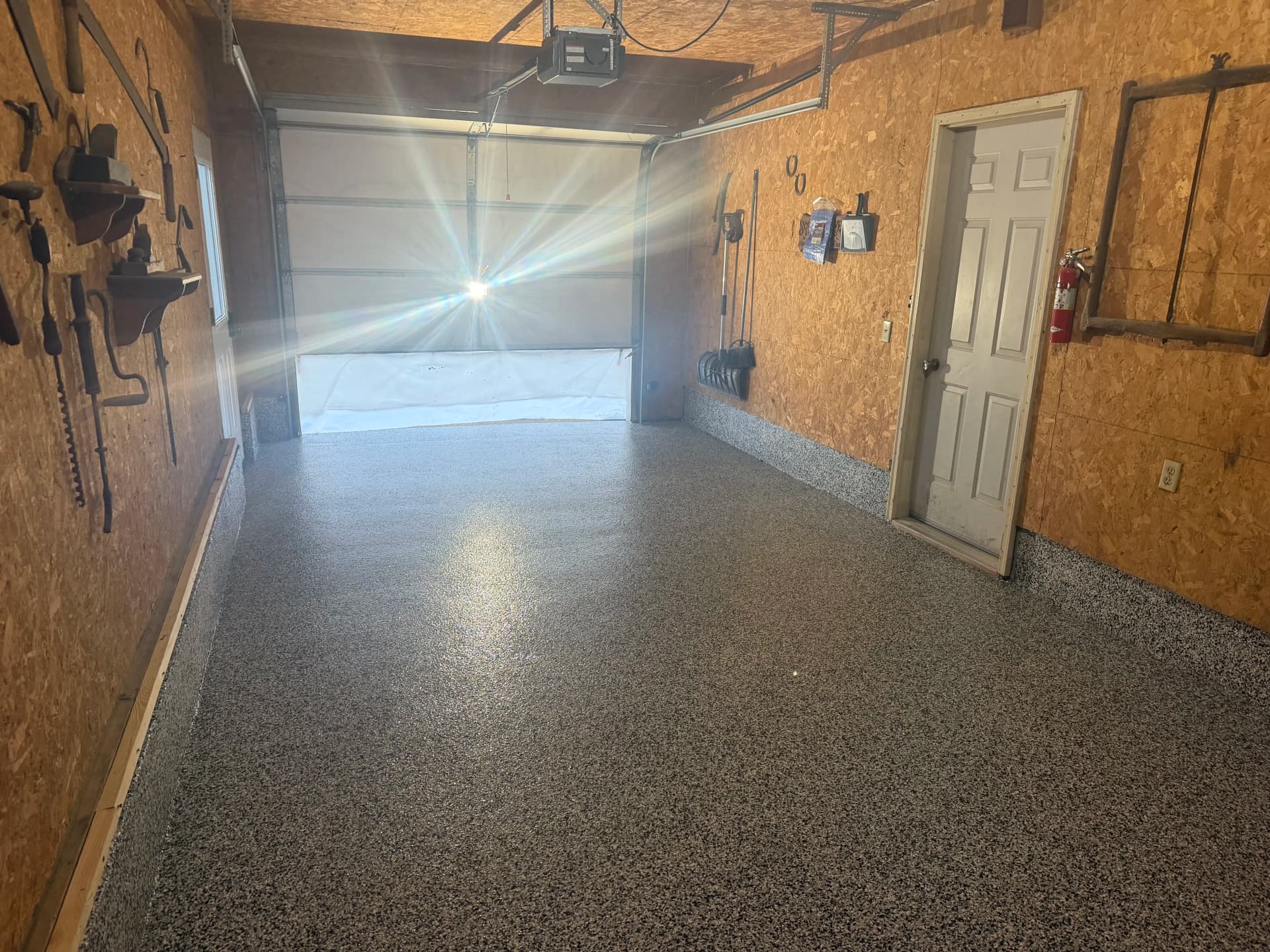 Gallery photos for Single-Stall Garage Floor Coated in Domino Flake: Image #1