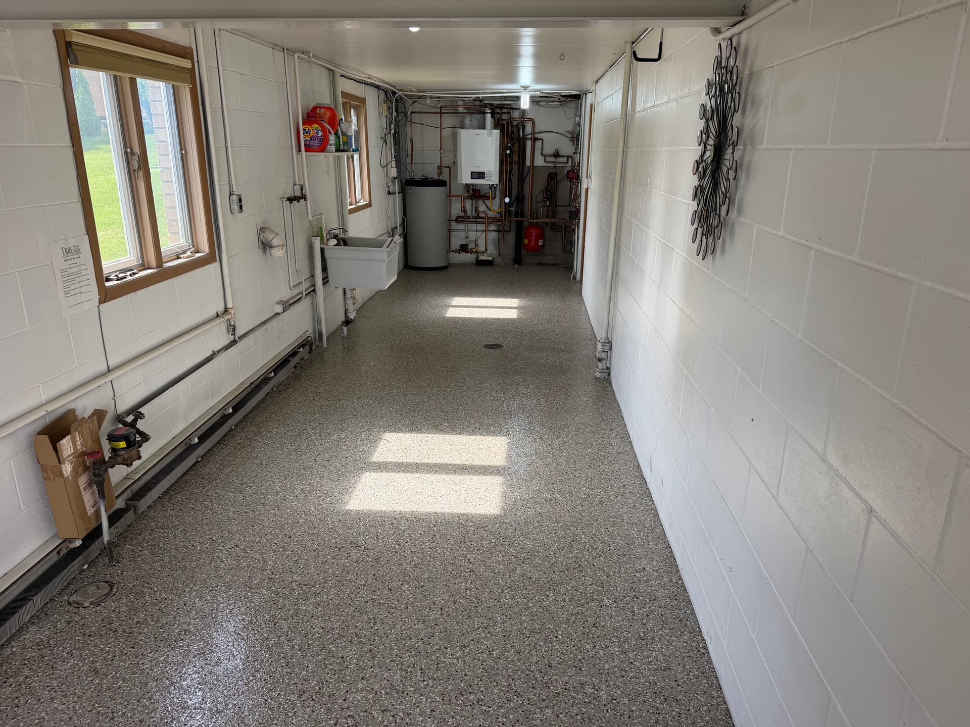 Gallery photos for Creekbed Flake Floor System Covers a 2-Stall Garage and Sunroom: Image #3