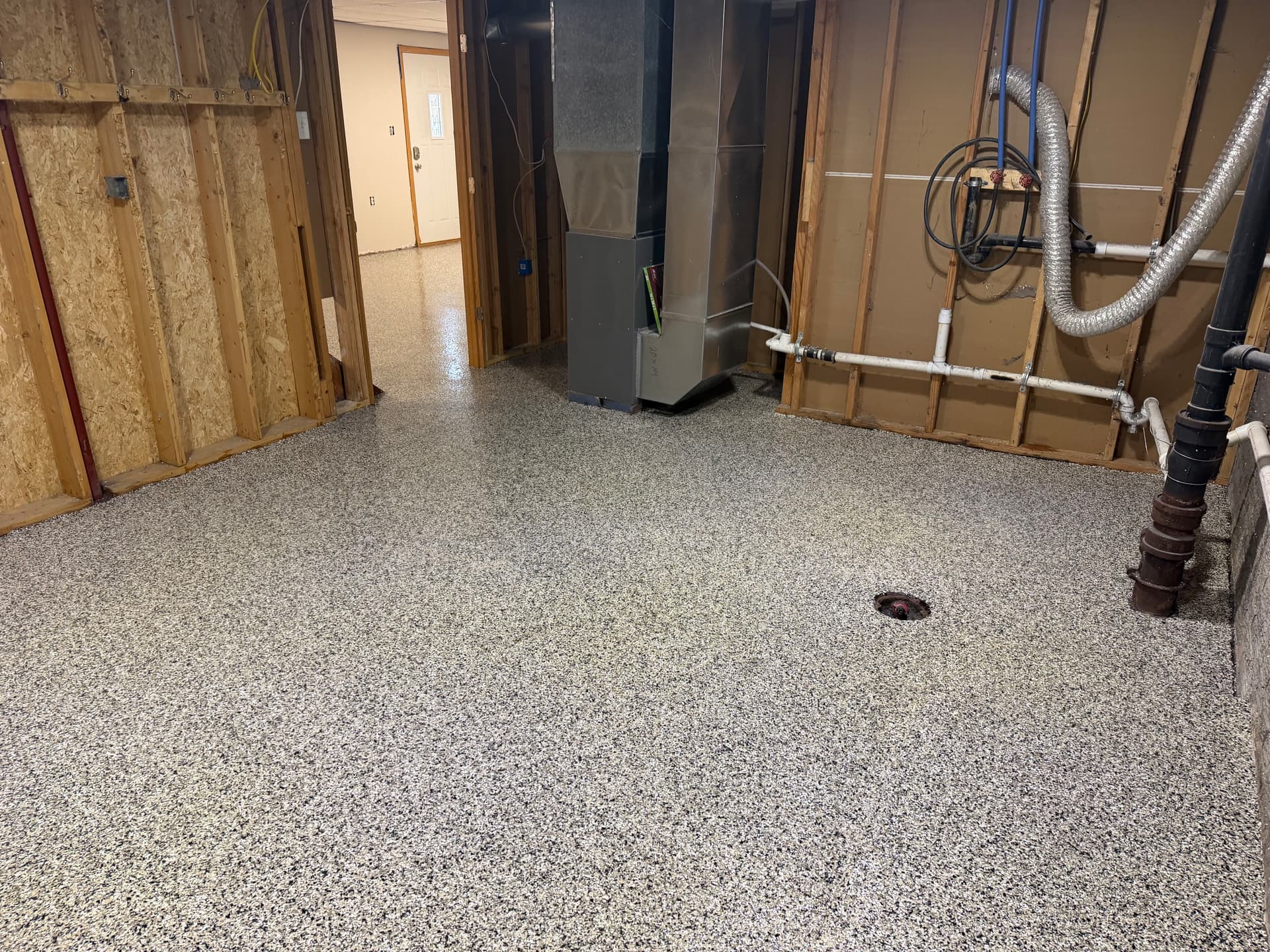 Gallery photos for Epoxy Flake Floors Installed in a Basement and Garage: Image #3