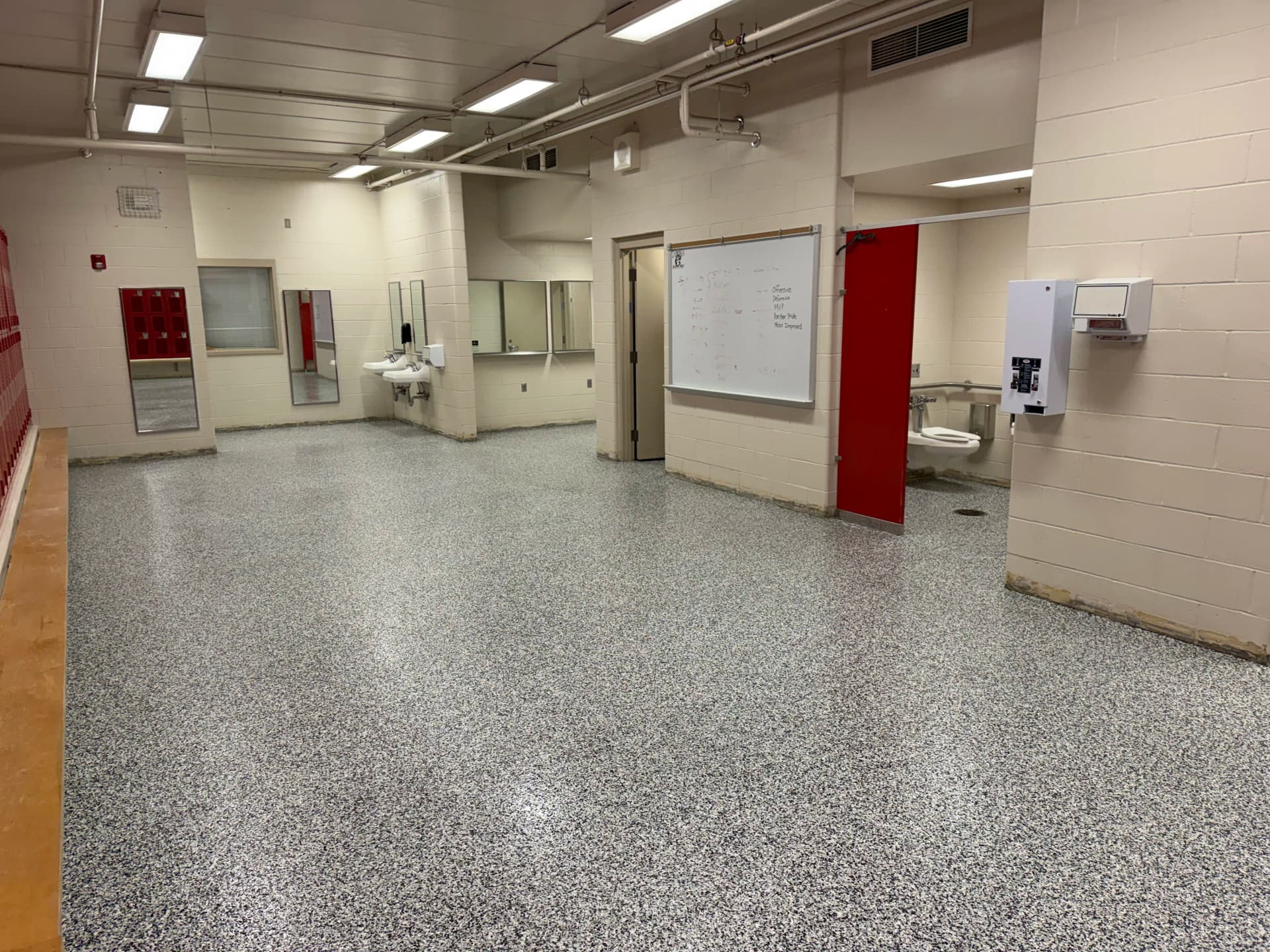 Gallery photos for Monticello High School Locker Rooms Get a Heavy-Duty Flake Floor: Image #3