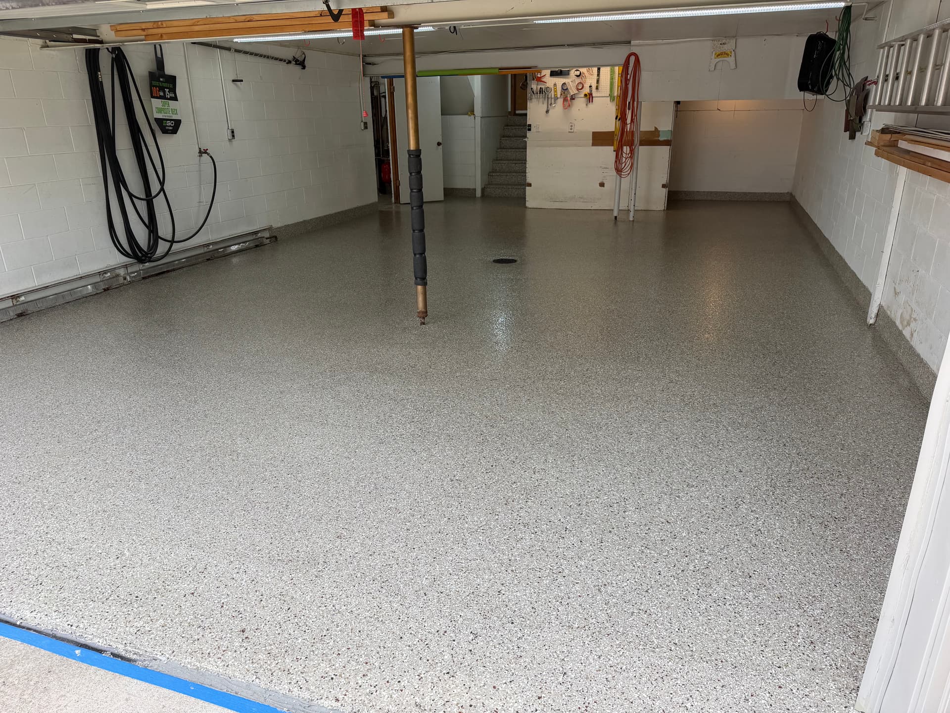 Gallery photos for Creekbed Flake Floor System Covers a 2-Stall Garage and Sunroom: Image #4