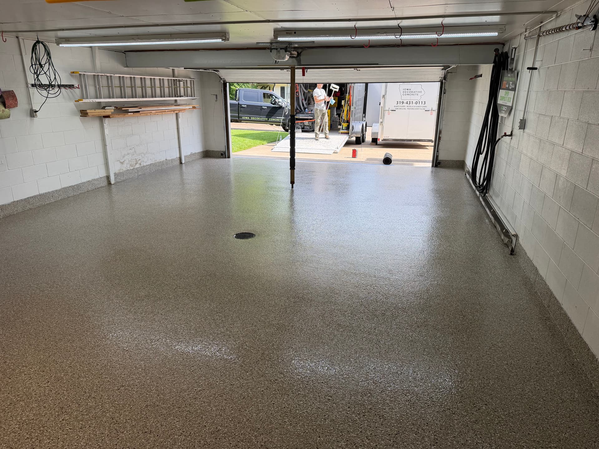 Gallery photos for Creekbed Flake Floor System Covers a 2-Stall Garage and Sunroom: Image #2