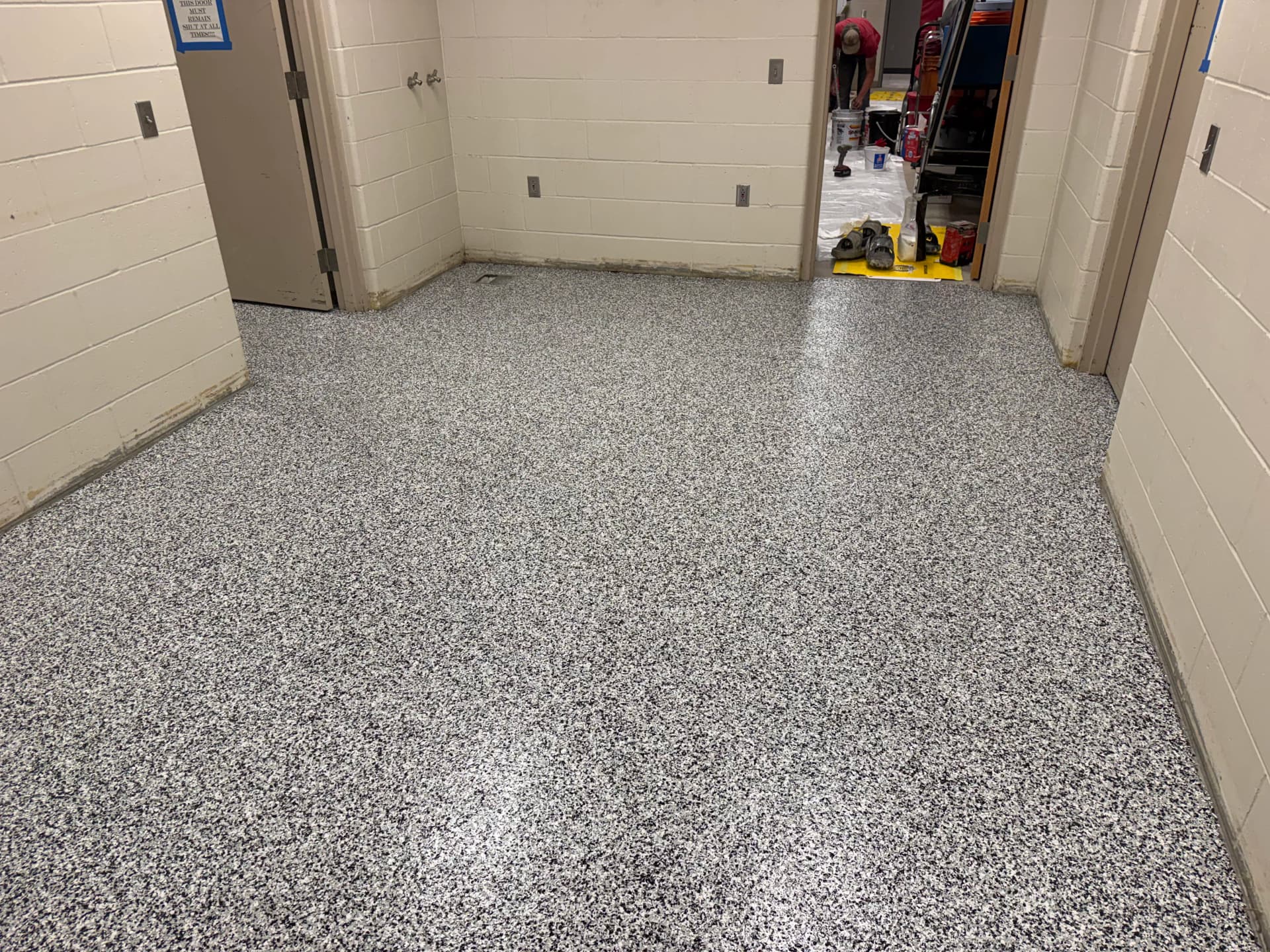 Gallery photos for Monticello High School Locker Rooms Get a Heavy-Duty Flake Floor: Image #9