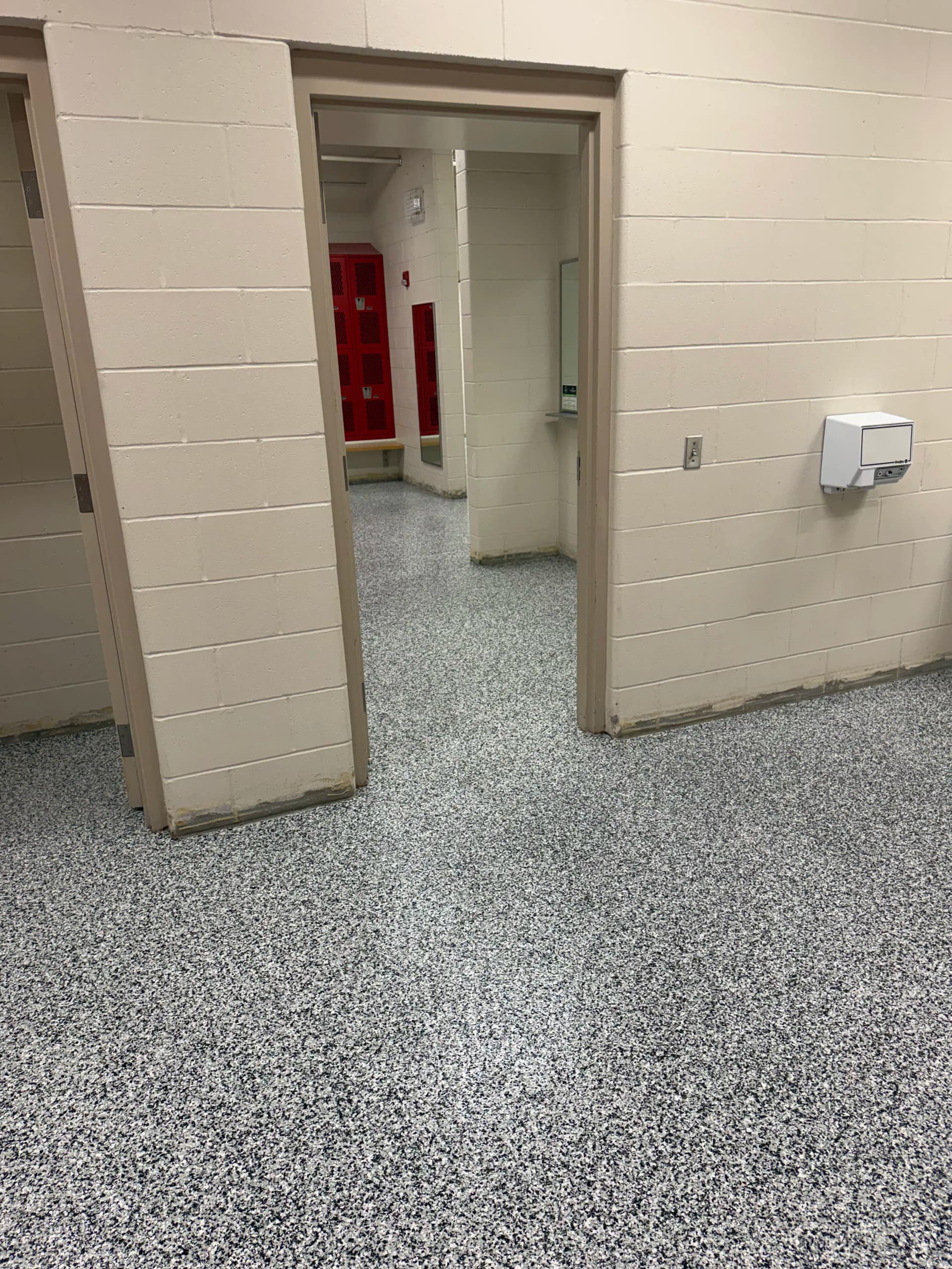 Gallery photos for Monticello High School Locker Rooms Get a Heavy-Duty Flake Floor: Image #7