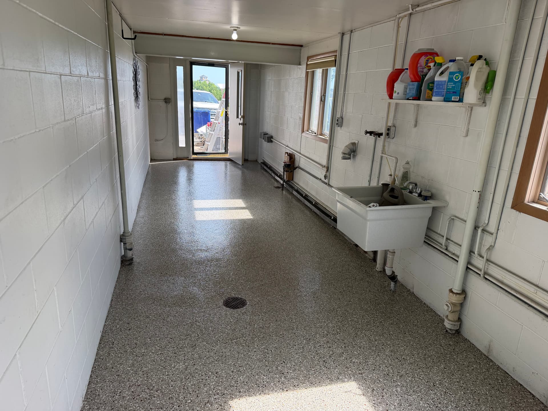 Gallery photos for Creekbed Flake Floor System Covers a 2-Stall Garage and Sunroom: Image #5