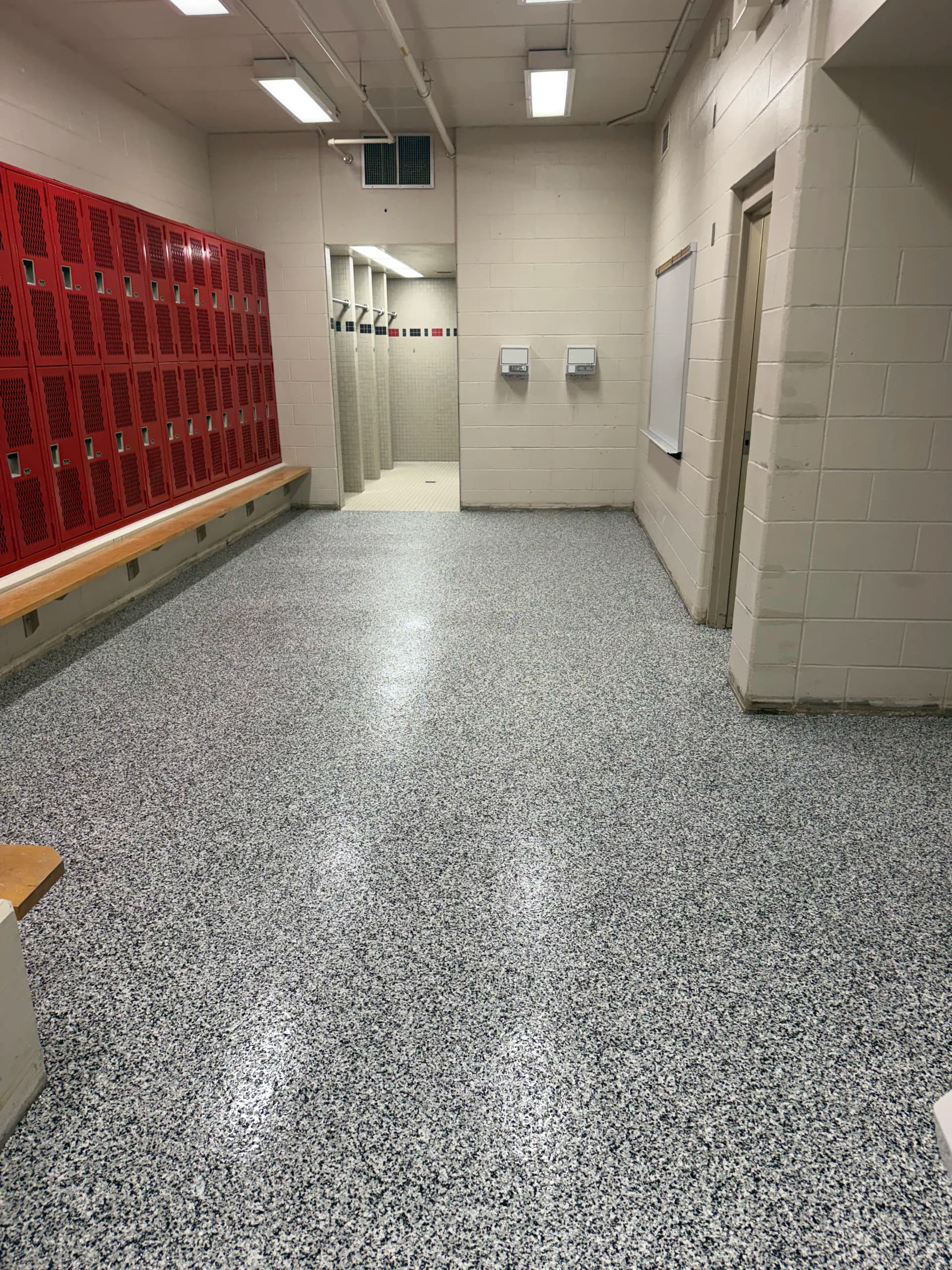 Gallery photos for Monticello High School Locker Rooms Get a Heavy-Duty Flake Floor: Image #5